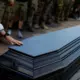 Krievijas Ciniskais Viltus: 20 Ienaidnieka Līķi Uzdoti par Ukrainas Kritušajiem, Atmasko Zelenskis