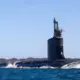 Lielbritānija un Austrālija nostiprina AUKUS ar vēsturisku līgumu, ASV pārskata dalību