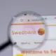 "Swedbank" peļņa Latvijā pirmajā pusgadā dramatiski sarūk: iemesli un plašāka ietekme uz finanšu sektoru