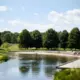 Uzvaras Parkā Iedegsies Jauna Kafejnīca: Rīgas Domes Izsole Pievilina Uzņēmējus